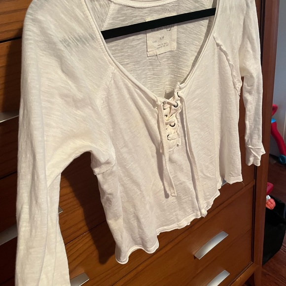 Brand: Free people Size: Small Style: White lace up top with quarter sleeves - Picture 2 of 4